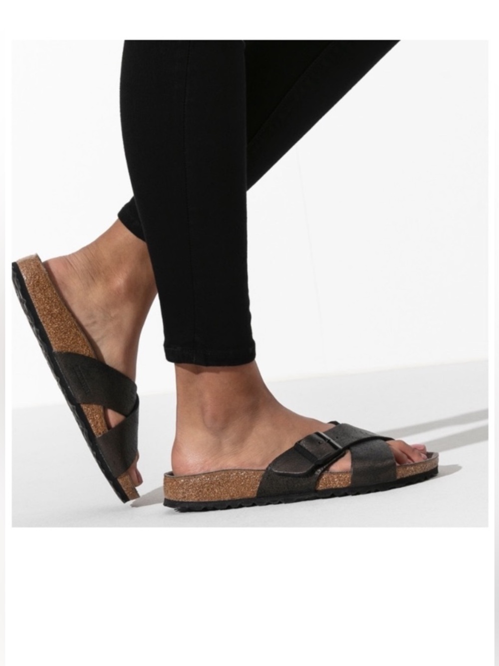 Betula by Birkenstock featuring a crisscross leather upper design.